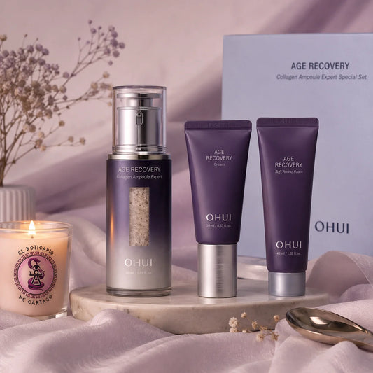 Set OHUI Age Recovery Collagen Ampoule Expert con sérum, crema y espuma limpiadora sobre bandeja de mármol con vela El Boticario de Cartago